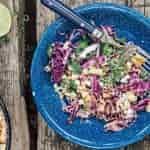 A bowl of Mexican street corn inspired coleslaw