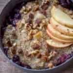 Bowl of quinoa porridge with apples.